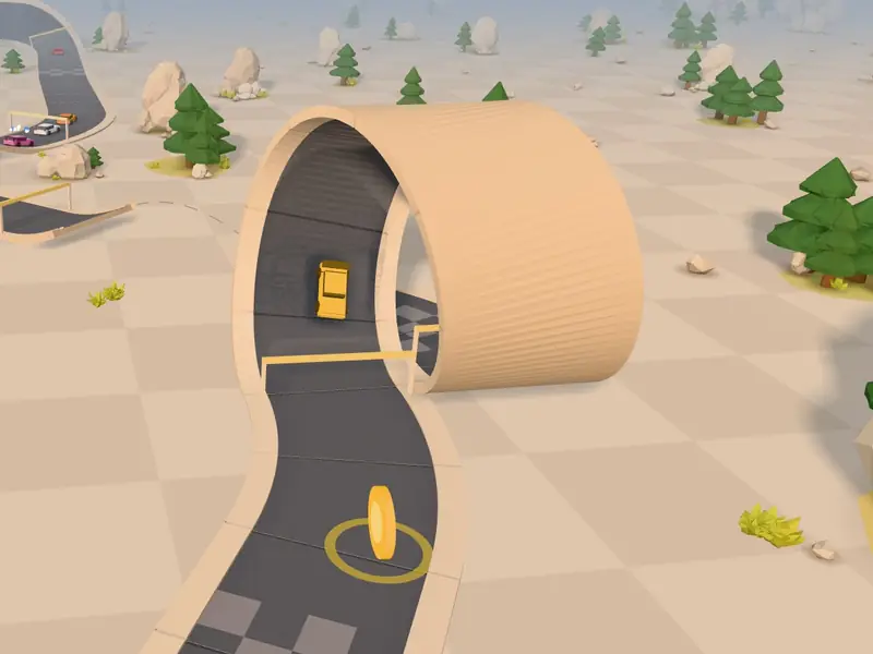 A yellow toy car going upside down through a loop